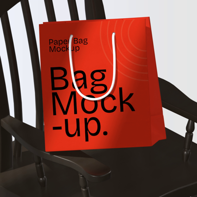 Red Shopping Bag On Black Wooden Rocking Chair Under Beautiful Lighting 3D Mockup 3D Template